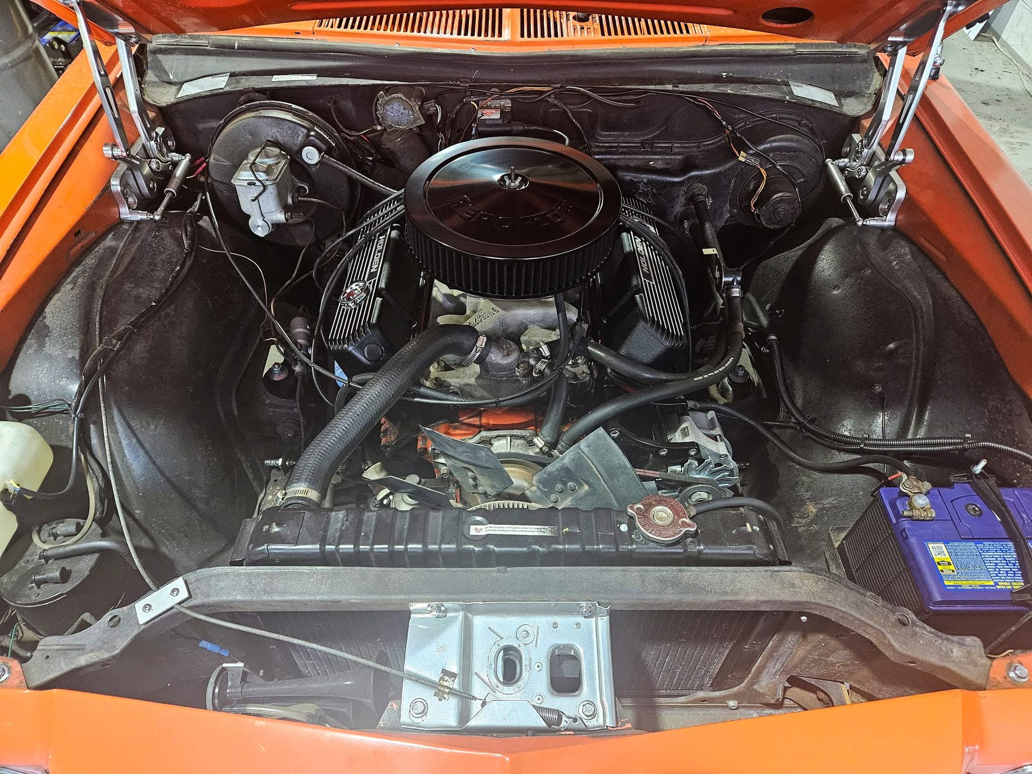 Engine bay work in progress at the Modified Automotive workshop